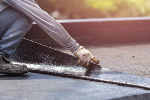 Professional Waterproofing technician working in Pompeii, MI